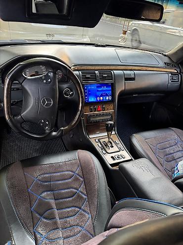 w210 panel: Mercedes‑Benz E‑Class (W210) sedan, qara rəng, tünd plyonka ilə — 5