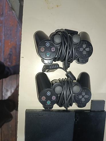 switch 2: Sony PlayStation 2 Slim komplekti Məzmun: - PlayStation 2 Slim — 3