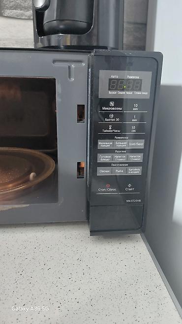 ucuz printer satilir: Panasonic mikrodalğalı soba – model NN-ST25HB - Rəng: qara, şüşə ön — 3
