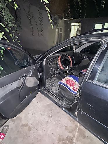 Продажа авто: Ford Focus: 2003 г., 1.6 л, Механика, Бензин, Универсал — 3