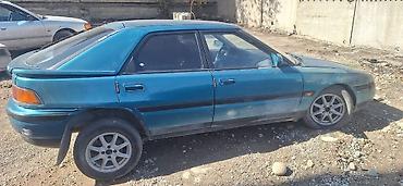 323: Mazda 323: 1994 г., 1.6 л, Механика, Бензин, Хэтчбэк — 5