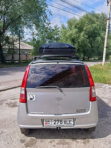 bus: Daihatsu Cuore: 2005 г., 1 л, Механика, Бензин, Купе — 4