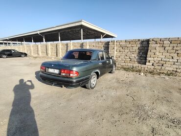 диски уаз на волгу: GAZ-3110 Volga sedan - Gövdə: 4 qapılı sedan, tünd-yaşıl rəng -