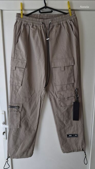 lay zenske sa uckurom na nogavicama: Pantalone XL (EU 42)