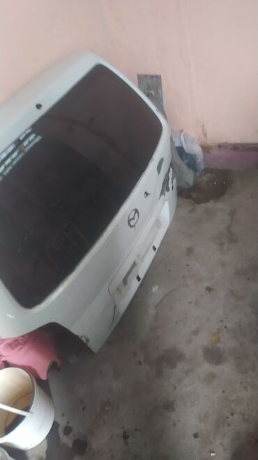 белая mazda: Крышка багажника Mazda 2000 г., Б/у, цвет - Белый,Оригинал