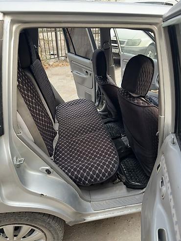 Mazda: Mazda Demio: 2002 г., 1.5 л, Автомат, Бензин, Купе — 8