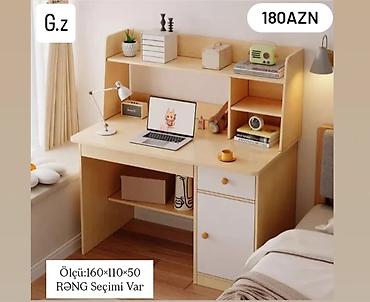 notebook masası: - Yazı/Masa dəsti – üst rəfli, çoxfunksiyalı model - Qiymət: 180 AZN — 1