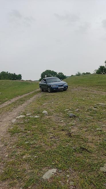 машина посат: Mazda 626: 1998 г., 1.8 л, Механика, Газ, Седан — 8