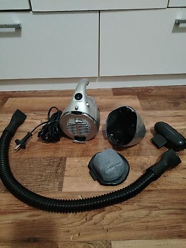 Ručni usisivači: Ručni električni usisivač – Candy Star (mrežni, sa dodacima) Opis: - — 10