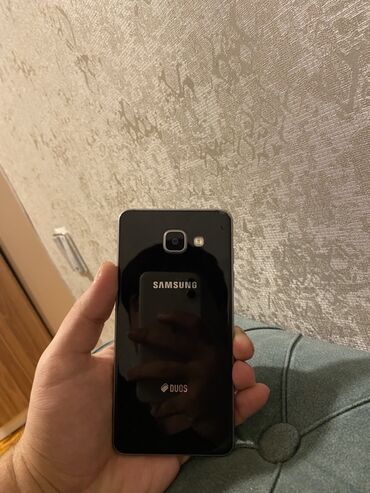 телефон fly 516: Samsung Galaxy A5 2016, 16 ГБ, цвет - Черный