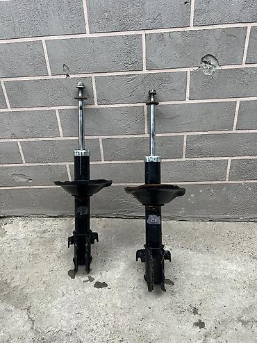 Амортизаторы, пневмобаллоны: Передний амортизатор Subaru — 2