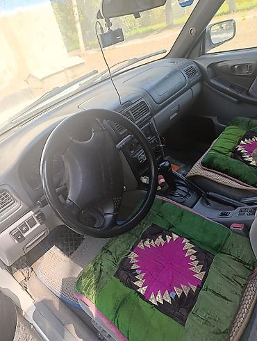 lancer 10: Subaru Forester: 1998 г., 2.5 л, Бензин, Универсал — 5