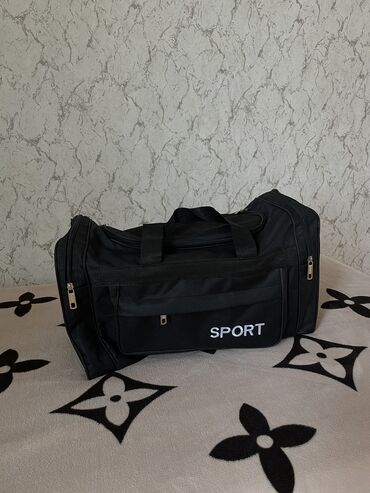 qaçış trenajoru kreditle: Yeni İdman çantası(Sumka)Sport bag Uzunu-50sm Eni-20sm Hündürlüyü-25sm