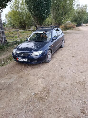 молдинги на пассат: Mazda 323: 2002 г., 2 л, Механика, Дизель, Универсал