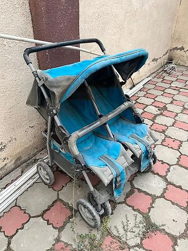 двойные коляски: Детская коляска для двойни (side-by-side) - Два полноценных сиденья — 1