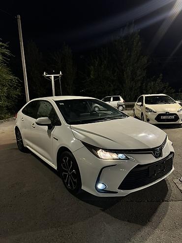 byd e1: Toyota Corolla: 2022 г., 1.8 л, Автомат, Гибрид, Седан — 1