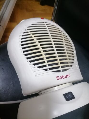 Kaloriferi: Grejalica duvaljka 2 brzine plus ventilator Saturn 2000w Okreće pri — 5
