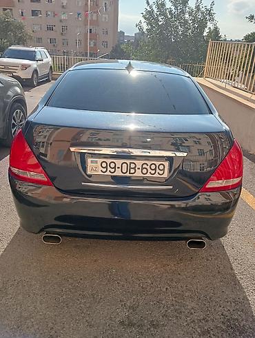 Транспорт: Nissan Teana – qara rəngli, geniş və komfortlu sedan. Xüsusiyyətlər — 4