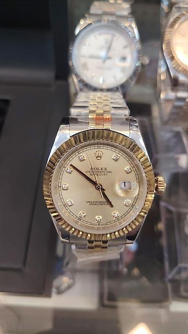 ag saat: Rolex Datejust və Day-Date kolleksiyasından kişi qol saatları — 2