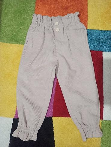 empire koferi: Dečije pantalone od rebrastog somota (kord) u svetlo bež boji . - — 1