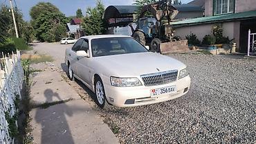 цилиндры: Nissan Laurel: 2003 г., 2 л, Автомат, Газ, Седан — 1