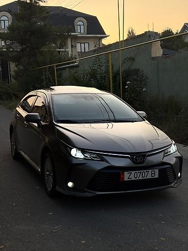 prado 78: Toyota Corolla: 2020 г., Гибрид, Седан — 3