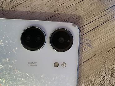 Мобильные телефоны: Смартфон с двойной основной камерой 50 МП (AI Camera) Особенности: - — 4