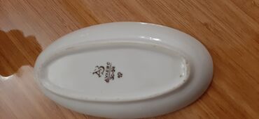 Ev üçün digər mallar: Ağ rəngdə, oval formalı, üzərində kiçik naxışlar olan boşqab — 11