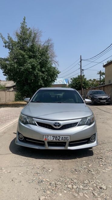 самая дорогая машина в кыргызстане: Продается седан Toyota Camry серебристого цвета. Автомобиль отличается