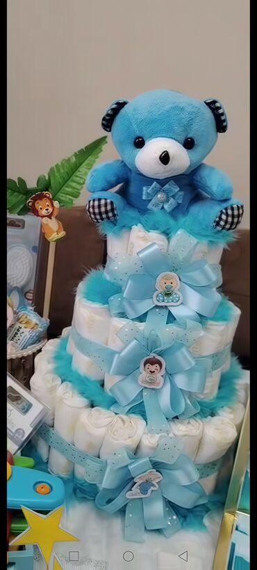 Pərdə və jalüzlər: Məhsul: Uşaq bezlərindən hazırlanmış hədiyyə “diaper cake”