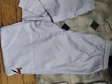 idman formalari: Dəstə daxil olanlar: - 1 ədəd WT dobok (üst + şalvar) - 1 ədəd Green — 3