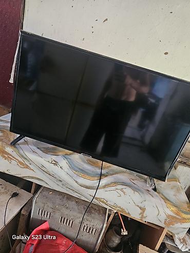 Телевизоры: Телевизор LED, диагональ примерно 43–50". Особенности: - — 15
