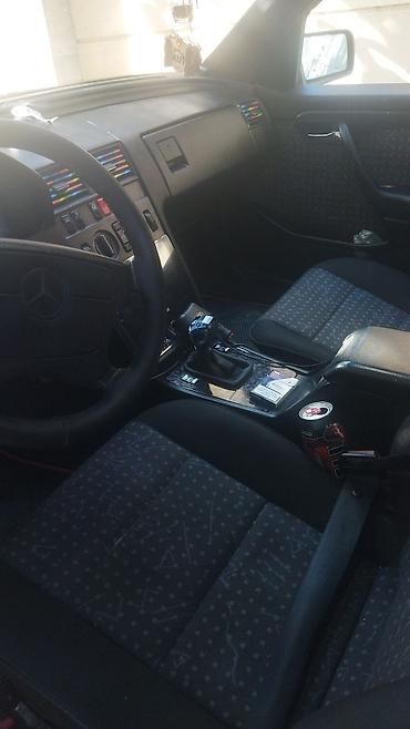 mersedes vozduxamer: Mercedes-Benz C‑Class (W202) sedan - Korpus: 4 qapılı sedan, qara — 5