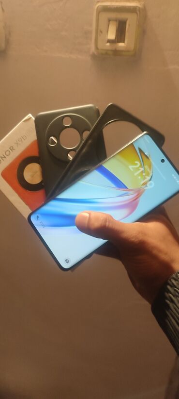 6300 telefon: Honor X9b, 256 GB, rəng - Gümüşü, Barmaq izi