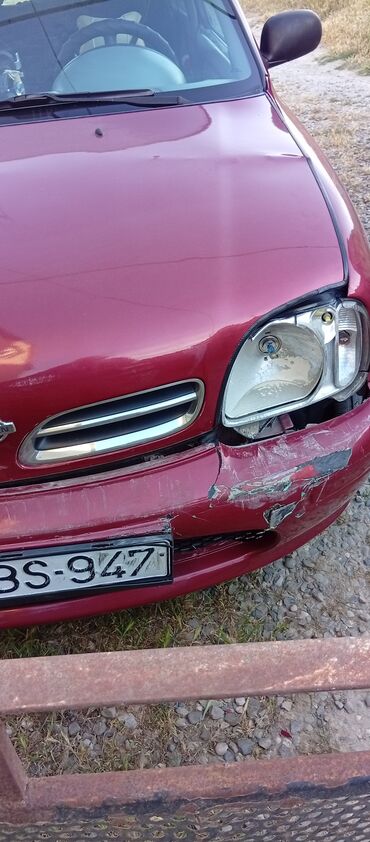 VAZ (LADA): Satılır, qirmizi metalik rəngdə olan Nissan Micra avtomobili. Maşın