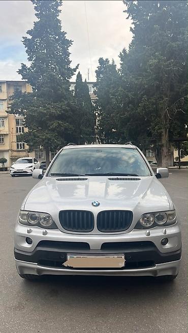 aqua disk: BMW X5: 3 l | 2005 il Krossover — 1