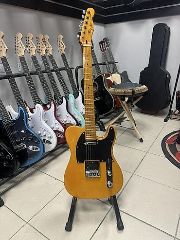 электрогитаа: Электрогитара типа Telecaster. Классический корпус Tele с односрезом — 1