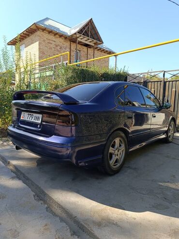 Другой тюнинг: Седан темно-синего цвета с аэродинамическим обвесом и заниженным — 8