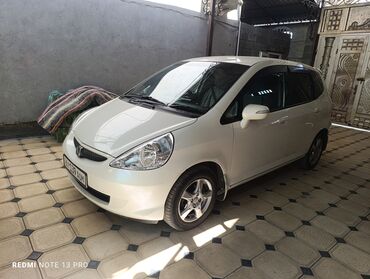 диска на хонда фит: Белый хэтчбек Honda Fit, идеально подходящий для городских поездок