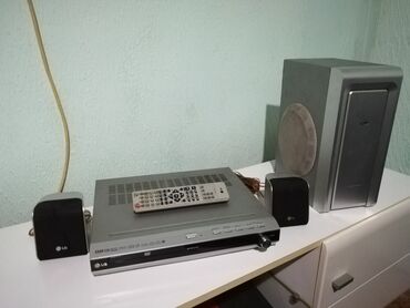 acura integra 1.8 mt: LG DAV-DZ20 kućni bioskop sistem. Uključuje DVD plejer/risiver, dva
