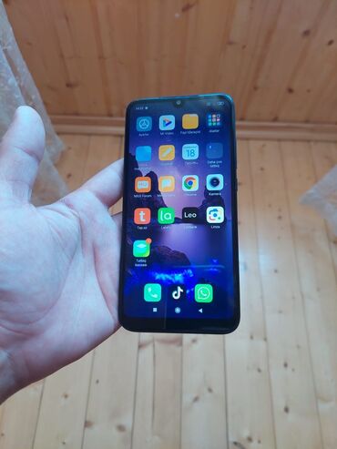 телефон fly evo tech 4: Xiaomi Redmi 7, 32 ГБ, цвет - Черный, 
 Сенсорный, Отпечаток пальца, Две SIM карты