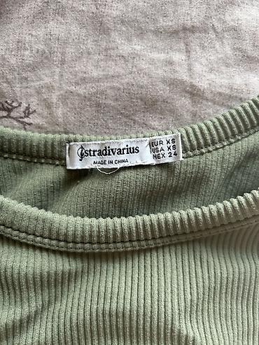 hırka: Stradivarius qadın topu - Model: qoltuqsuz, yuxa kəsimli (tank top) - — 2
