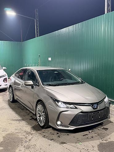 машины до 500: Toyota Corolla: 2023 г., 1.8 л, Автомат, Гибрид, Седан — 2