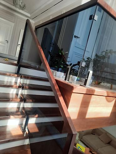 Изготовление перил: Элегантная винтовая лестница с перилами, выполненными из комбинации — 9