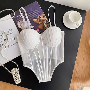 Korseti: 🔥Ženski korzet top – mrežasti bustier sa ojačanjima
2200 din — 4