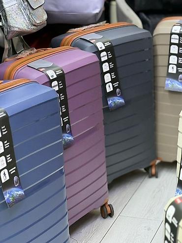 Чемоданы: Чемодан, Новый, Большой (более 70 л), Вращающиеся колеса на 360°, Кодовый замок, На колесах — 8