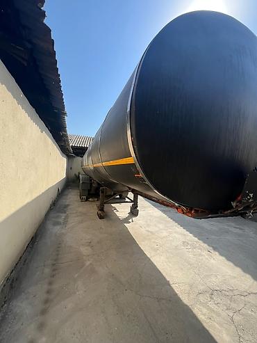 мата секыл: Полуприцеп-цистерна Schmitz Cargobull для перевозки опасных грузов. - — 4