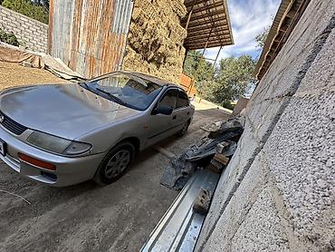 mazda axela: Mazda 323: 1996 г., 1.6 л, Механика, Бензин, Седан — 3