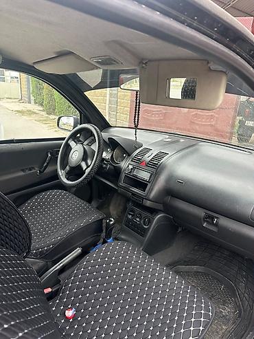 главная пара: Volkswagen Lupo: 2002 г., Механика, Бензин, Хэтчбэк — 4