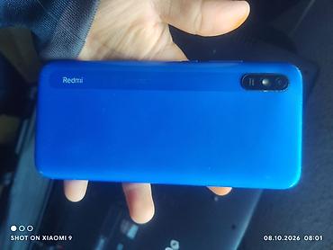 Смартфон Redmi (синего цвета) - Корпус: матовый синий, компактный